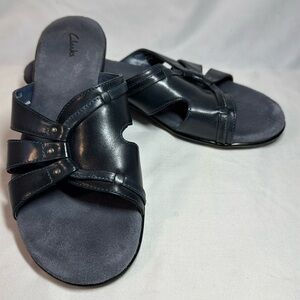 Clark’s navy leather sandals. Size 8.